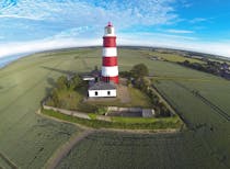 Take in the stunning views of Happisburgh Lighthouse