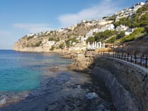 Explore Cala Llamp's Natural Rock Pools and Beach Club