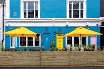 Enjoy cocktails and British menus at The Little Yellow Door