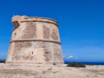 Take in the stunning views at Torre de sa Punta Prima