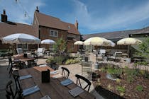 Enjoy traditional English fare and local ales at The Trooper