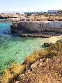 Take a Dip at the Grotta della Cala Tre Buchi