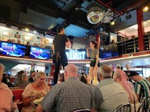 Experience the Singing Servers at Ellen's Stardust Diner