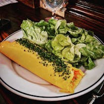 Make reservations at the Parisian restaurant, Petit Trois