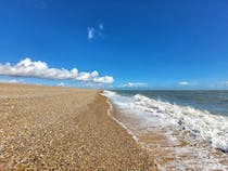 Explore Aldeburgh Beach's Charming Seaside Atmosphere