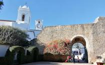 Explore the ruins of Castelo de Tavira