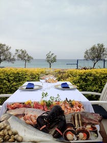 Dine at Sybius Cala Canyelles