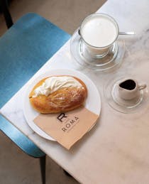 Enjoy a coffee or cocktail at Caffè Roma