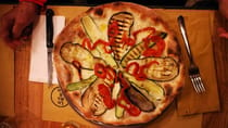 Enjoy authentic pizza at La NoRma Pizzeria