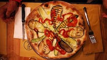 Enjoy authentic pizza at La NoRma Pizzeria