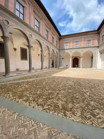 Explore the art museum at Palazzo Ducale
