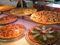 Enjoy authentic pizza at Chiaro Scuro Camucia AR