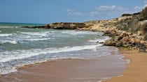 Grab your towel for a day at Cava D'Aliga Beach