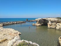 Explore the caves at Punta Cirica