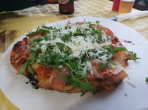 Sample local pizza at Pizzeria Peppe Drago