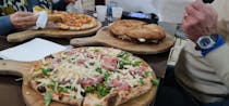 Savour authentic wood-fired pizza at Il Gatto e La Volpe