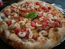 Indulge in mouthwatering pizzas at Il Vespro
