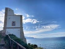 Stroll along the scenic path by the Torre San Giovanni