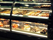 Grab fresh pastries at Cristal Caffè