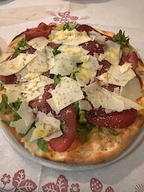 Indulge in authentic pizza at Le Quattro Stagioni