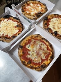 Enjoy authentic Sicilian pizza at Pizzeria Arricriati