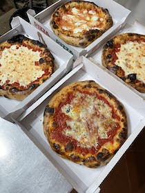 Enjoy authentic Sicilian pizza at Pizzeria Arricriati