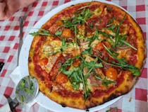 Try the pizza at Trattoria La Famiglia