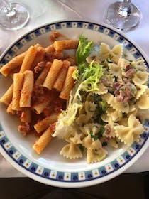 Dine at Trattoria Carricaturi Di Barranco