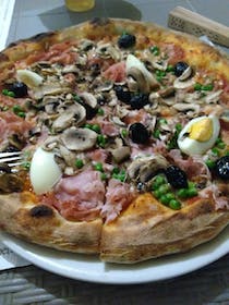 Dine at Pizzeria Arte Barocca