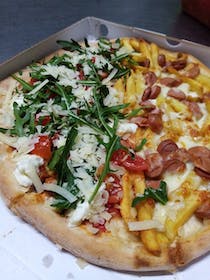 Enjoy Jimmi Pizza's delicious pizzas