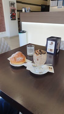 Grab a quick coffee and pastry at The One Caffé