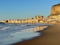 Experience the tranquil beauty of Spiaggia di Cefalù