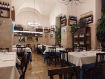 Share a seafood dinner at Hosteria del Panda
