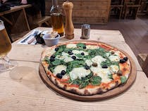 Enjoy authentic Italian pizzas at Natura