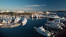 Stroll along the glamorous Port Pierre Canto