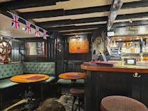 Enjoy an authentic pub experience at The Hole In The Wall