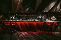 Grab a cocktail at the Black Moon Lounge