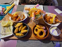 Try the prawn tapas at Nikaia Bar Marina
