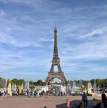 Relax and admire the Eiffel Tower at Champ de Mars