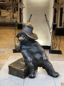 Take a photo with the Paddington Bear Statue
