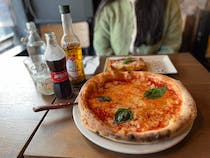 Indulge in Italian pizza at il Macchiato