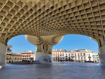 Step under the iconic Setas de Sevilla