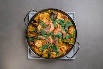 Try the paella at Restaurante La Barraca de Amparo