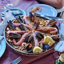 Try the paella at Restaurante Doña María