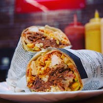 Try the burritos at Faro Food