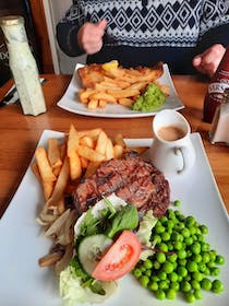 Enjoy the pub grub at The Floating Bridge