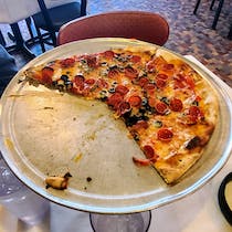 Savor Delicious Coal-Fired Pizzas at Patsy's Pizzeria