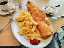 Savour traditional fish and chips at Squires