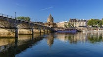 Cross the Seine at Pont des Arts