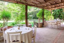 Dine on the terrace at Locanda Quattro Vesta